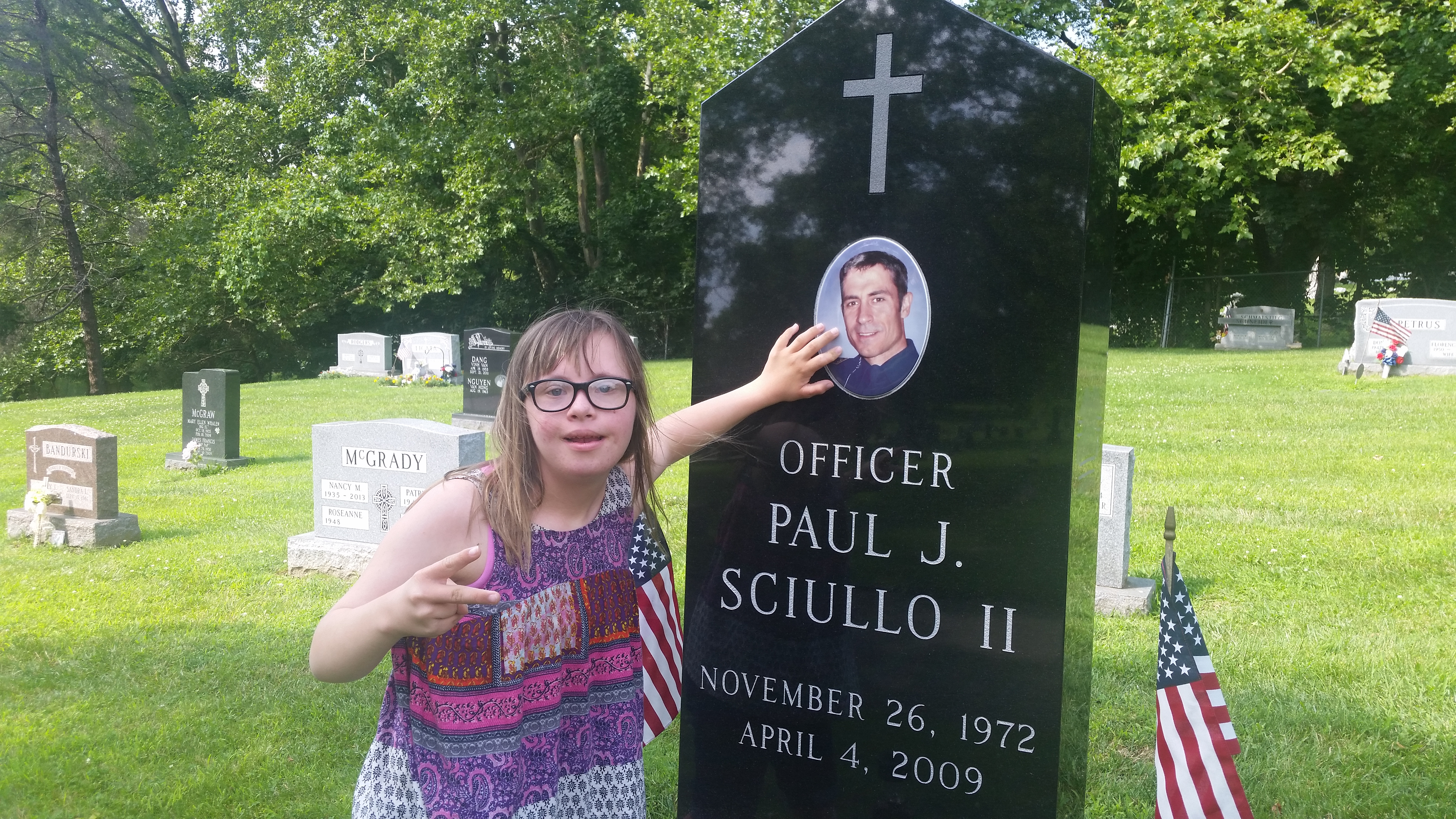 Chloe at police officer's grave